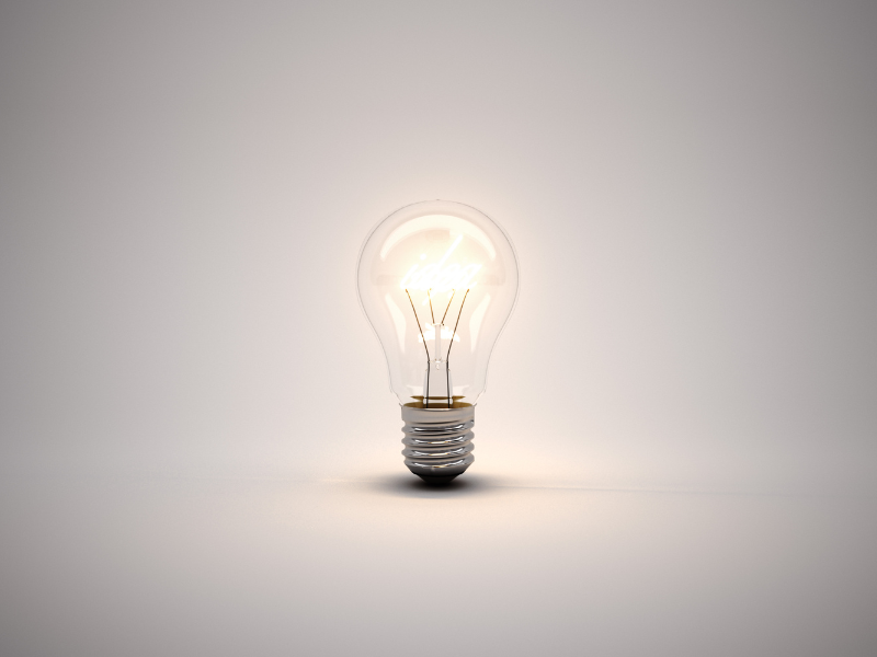 a lightbulb against a grey background