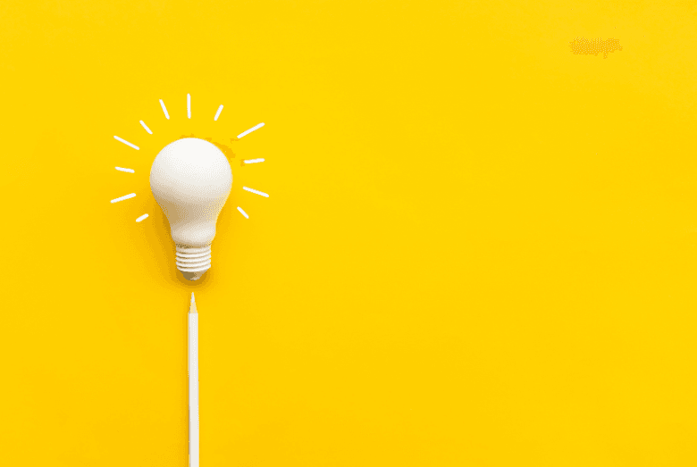 Yellow background with white lightbulb